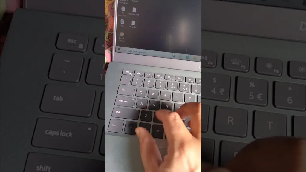 Locating the Sleep Button on a Dell Laptop: